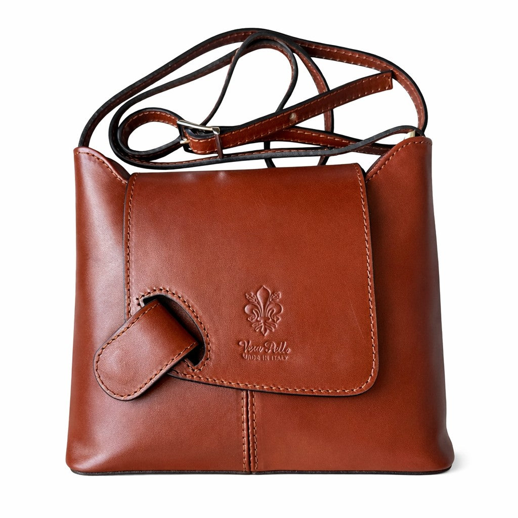LaGaksta Brown Italian leather crossbody with embossed ‘Vera Pelle Made in Italy’ text on the front flap, adjustable shoulder strap, and sleek minimalist design